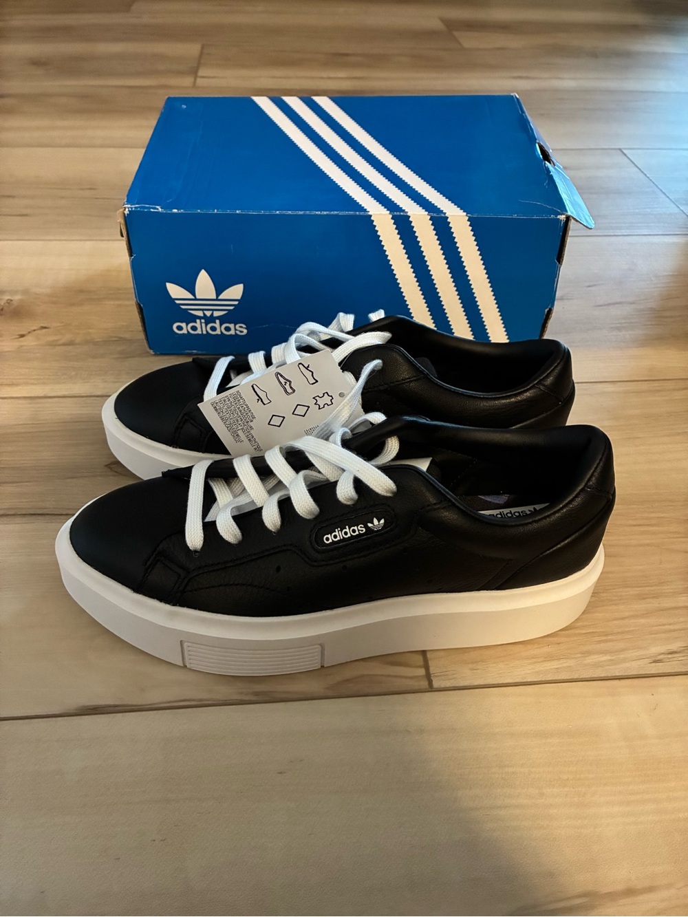 adidas Women’s Black and White Leather Platform Sneakers
